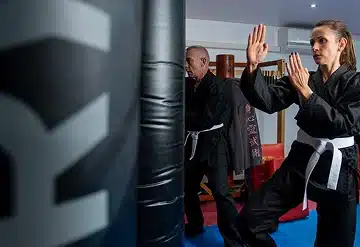 Adults practising martial arts at BMS WooShoo